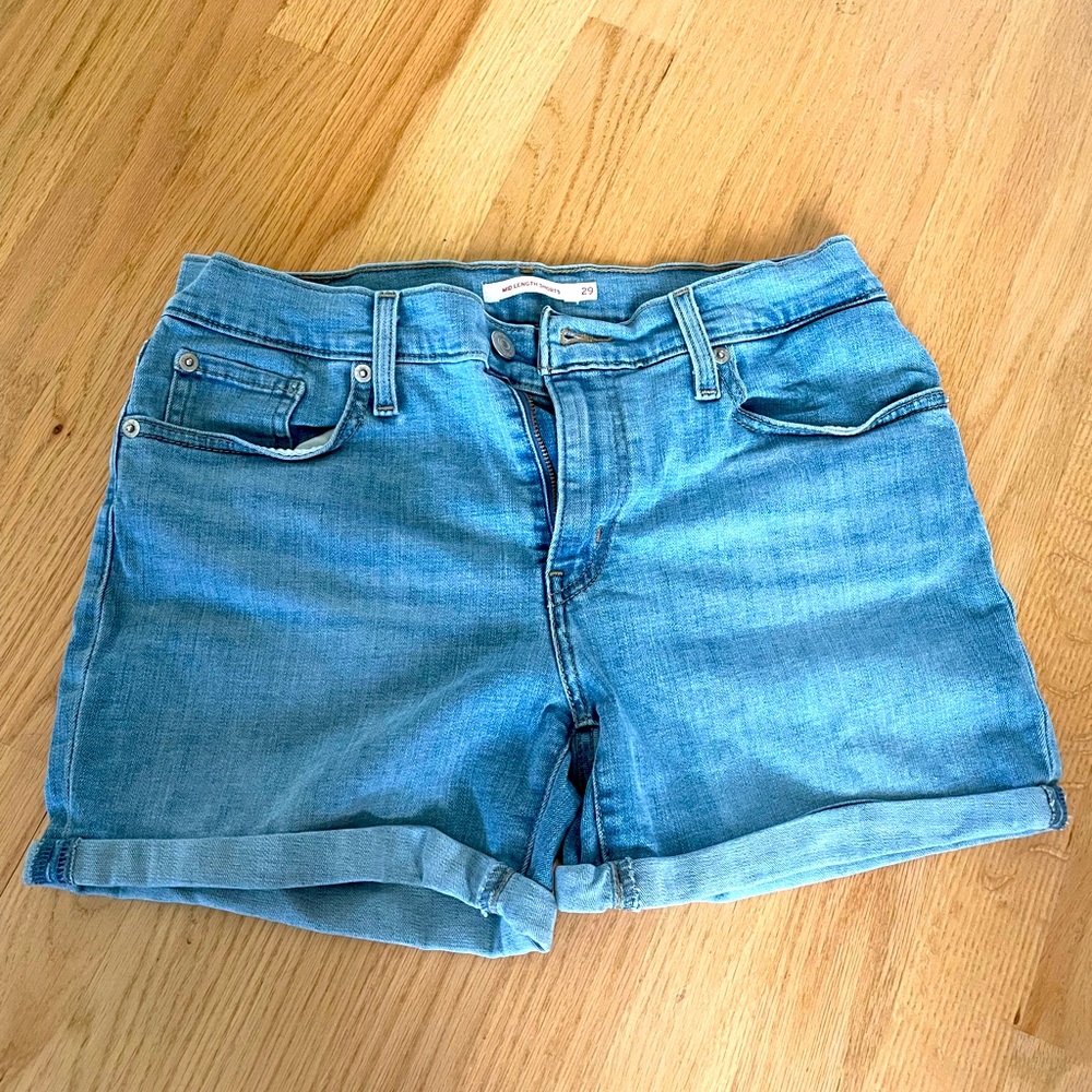 Levi’s mid length jean shorts